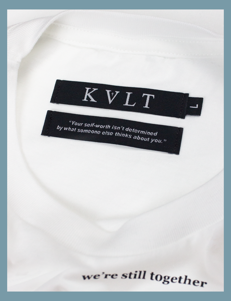 Close-up view of the twin self-worth neck labels on the ALWAYS TOGETHER Tee by KULT Clothing | The bottom label reads "Your self-worth isn't determined by what someone else thinks about you." | eco-friendly, climate neutral t-shirt