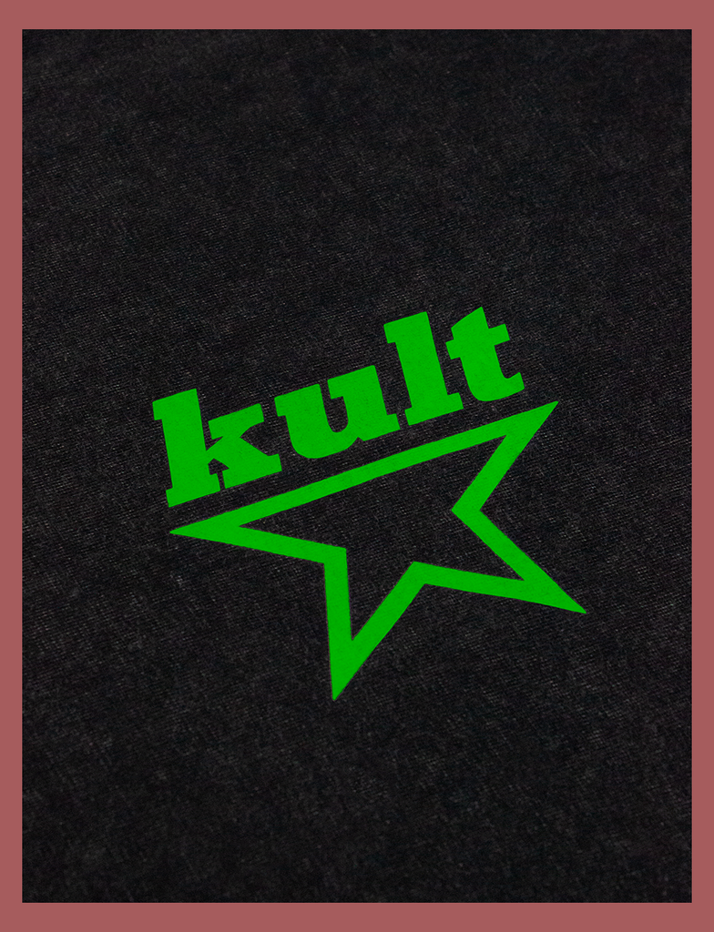 Close-up view of the print on the MEANINGFUL GOALS Tee by KULT Clothing | Featuring the KULT STAR logo on the left breast of the garment | Screen printed by hand in black using eco friendly inks