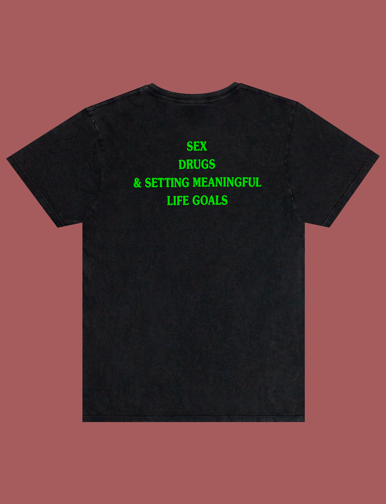 Reverse view of the print on the MEANINGFUL GOALS Tee in Sun-Bleached Black by KULT Clothing | Sex, Drugs, & Setting Meaningful Life Goals | Ethical t-shirt manufactured solely using renewable energy from wind and solar power