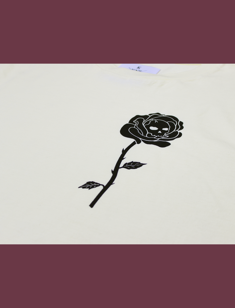 Close-up of the breast print on the GARDEN OF DEATH Tee in Primrose by KULT Clothing | eco-friendly, climate neutral t-shirt - thorned rose skull print