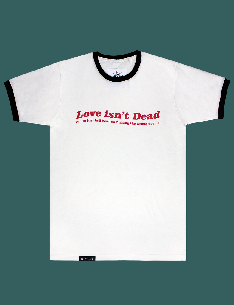 LOVE ISN'T DEAD Tee in a White Ringer style by KULT Clothing | eco-friendly, climate neutral t-shirt | Love isn't Dead you're just hell-bent on fucking the wrong people.