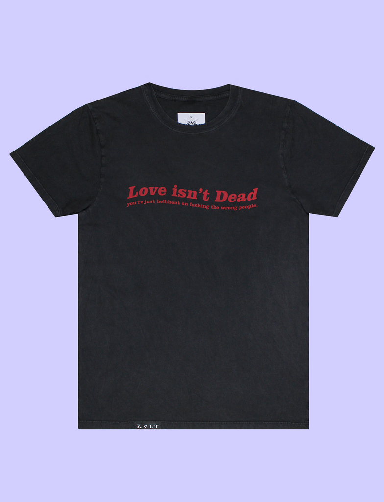 LOVE ISN'T DEAD Tee in Sun-Bleached Black by KULT Clothing | eco-friendly, climate neutral t-shirt | Love isn't Dead you're just hell-bent on fucking the wrong people.
