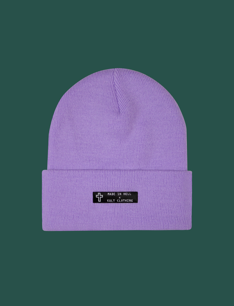 Front of the MADE IN HELL Beanie in Lavender by KULT Clothing | Black appliqué label on the front of a lavender-coloured, 100% acrylic knit beanie hat