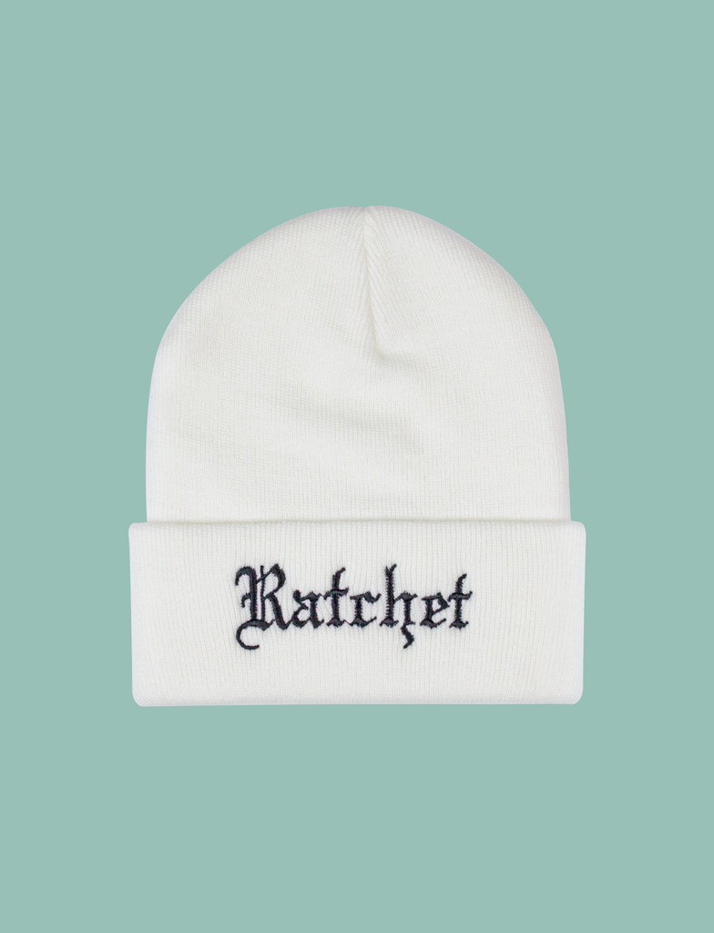 Ratchet Beanie in White by KULT Clothing | Black embroidered "Ratchet" in old English blackletter style on a white acrylic knitted beanie