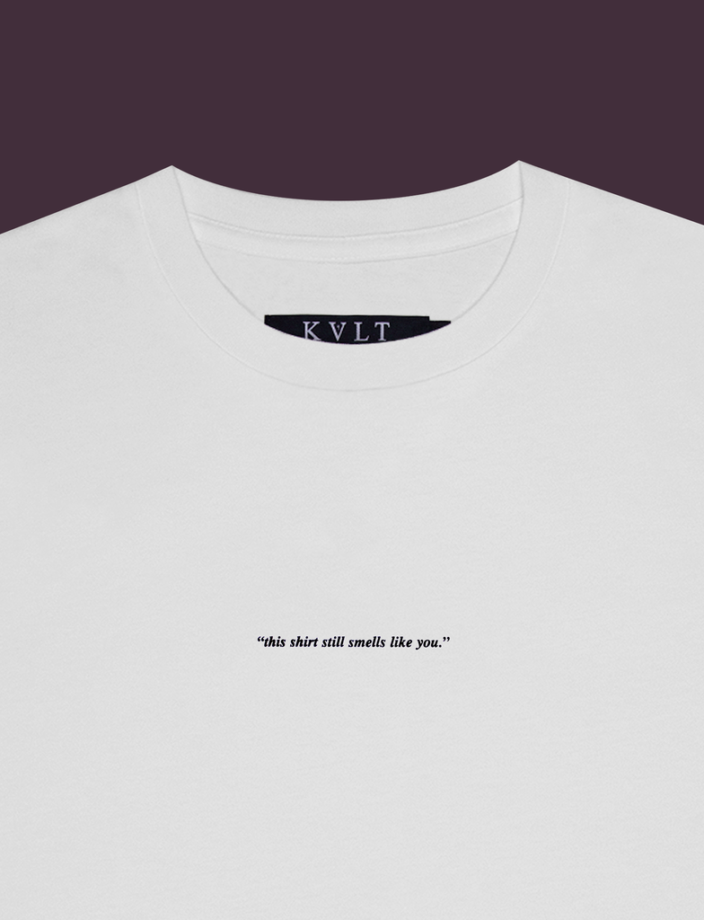 Close-up look of the print on the ALWAYS WITH YOU Tee in White by KULT Clothing | Screen printed by hand in black using eco friendly inks | "This shirt still smells like you."