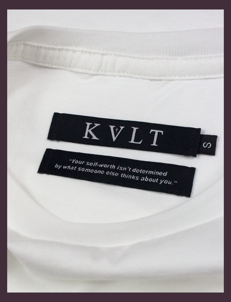 Close-up shot of the twin neck labels on the ALWAYS WITH YOU Tee in White by KULT Clothing | Screen printed by hand in black using eco friendly inks | "Your self-worth isn't determined by what someone else thinks about you."