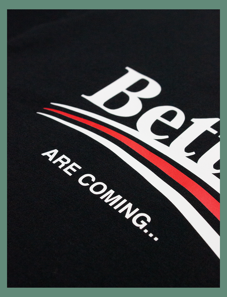 Close-up on the rear print on the BETTER DAYS Tee in Black by KULT Clothing | Better days are coming... | Created using our Barely There™ vinyl | Experience eco friendly, climate-neutral fashion that's all about softness