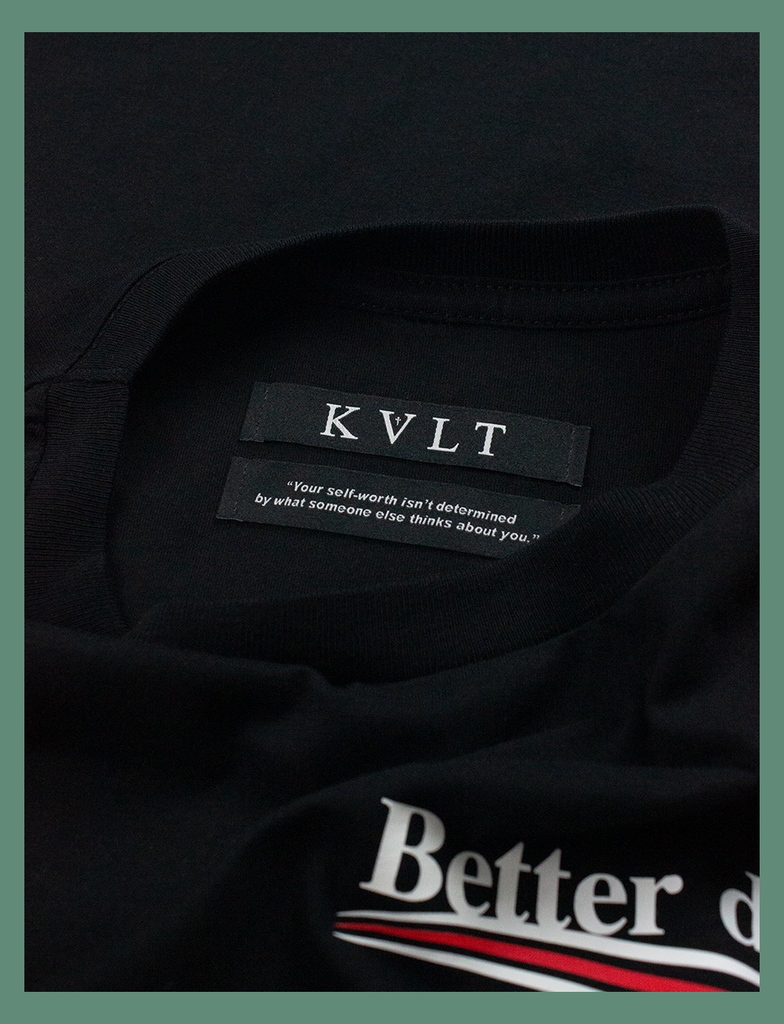 Close-up shot of the self-worth twin labels on the BETTER DAYS Tee in Black by KULT Clothing | "Your self-worth isn't determined by what someone else thinks about you."