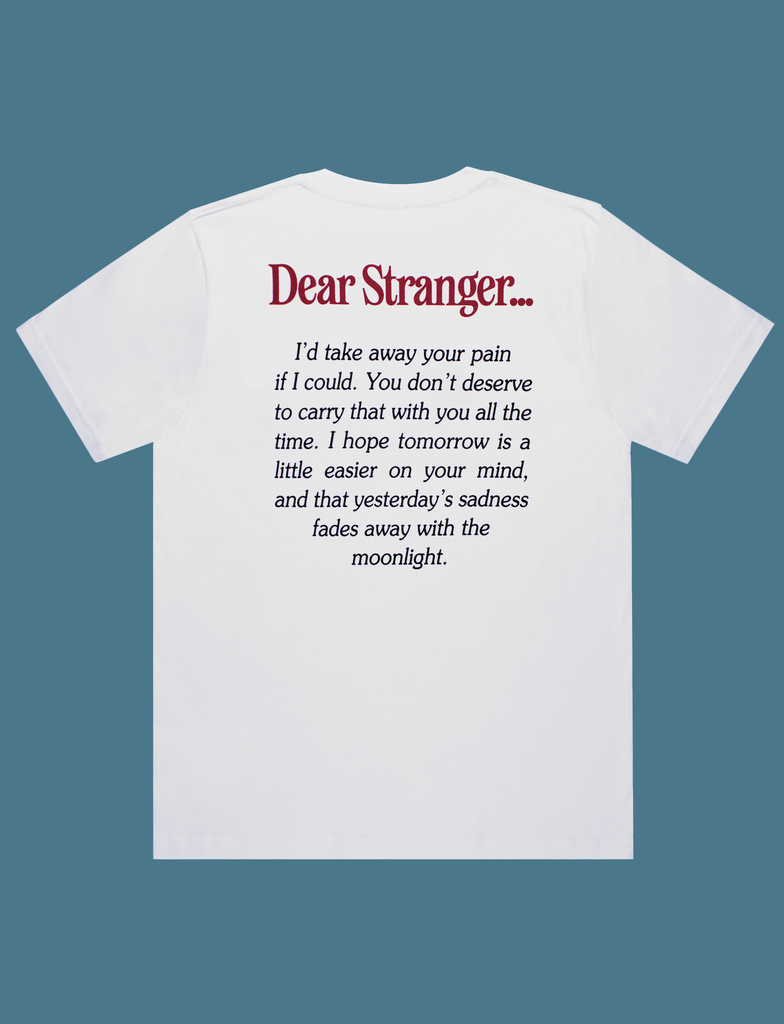Reverse view of the DEAR STRANGER Tee in White by KULT Clothing | It reads "I'd take away your pain if I could. You don't deserve to carry that with you all the time. I hope tomorrow is a little easier on your mind, and that yesterday's sadness fades away with the moonlight." | eco-friendly, climate neutral t-shirt