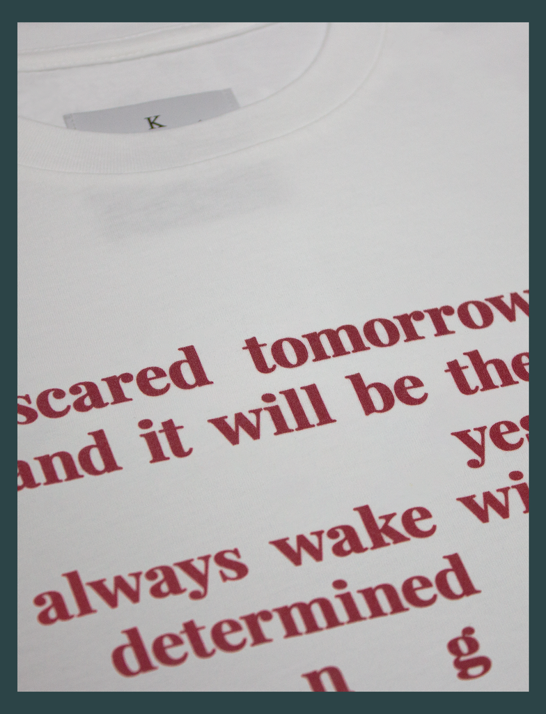 Close-up of the front print on the CHANGE Tee by KULT Clothing | "I am scared tomorrow will come, and it will be the same as yesterday. But I always wake with fresh eyes, determined to see change." KULT