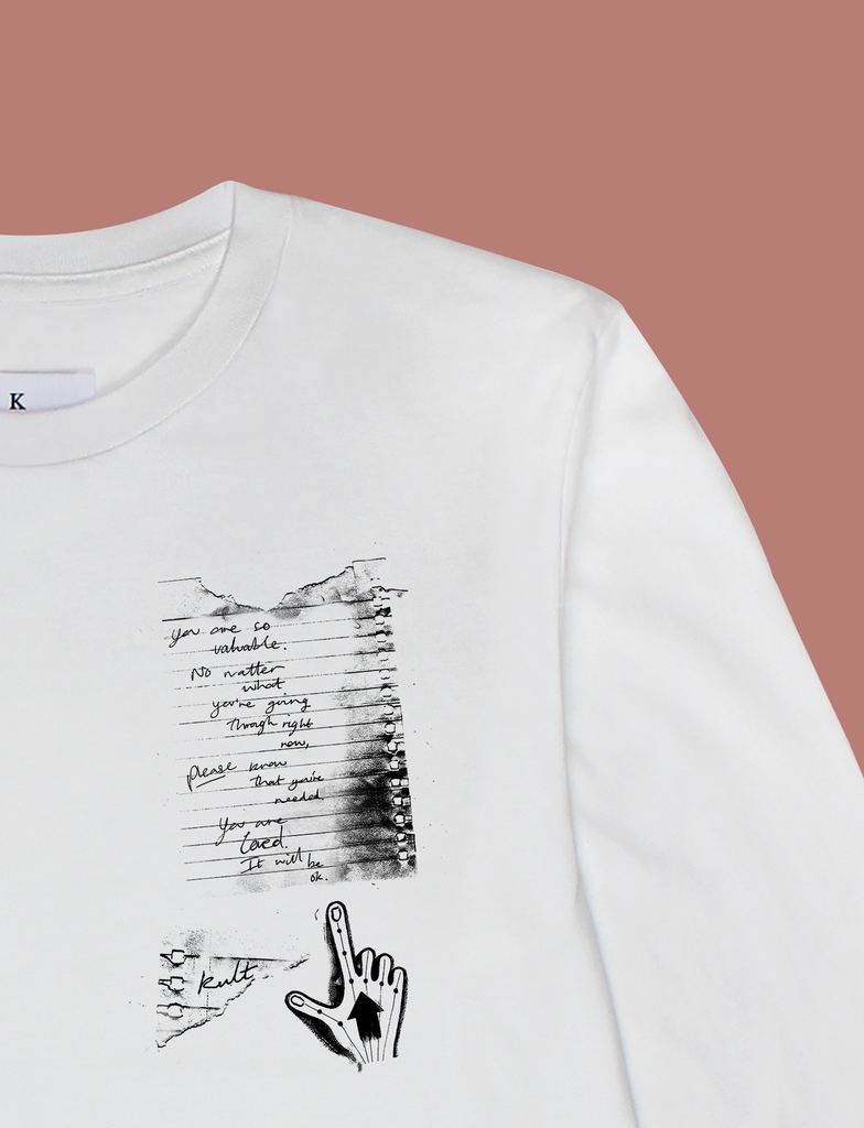 Close-up of the print on the IT WILL BE OK Longsleeve Tee by KULT Clothing | You are so valuable. No matter what you're going through right now, please know that you're needed. You are loved. It will be ok. KULT