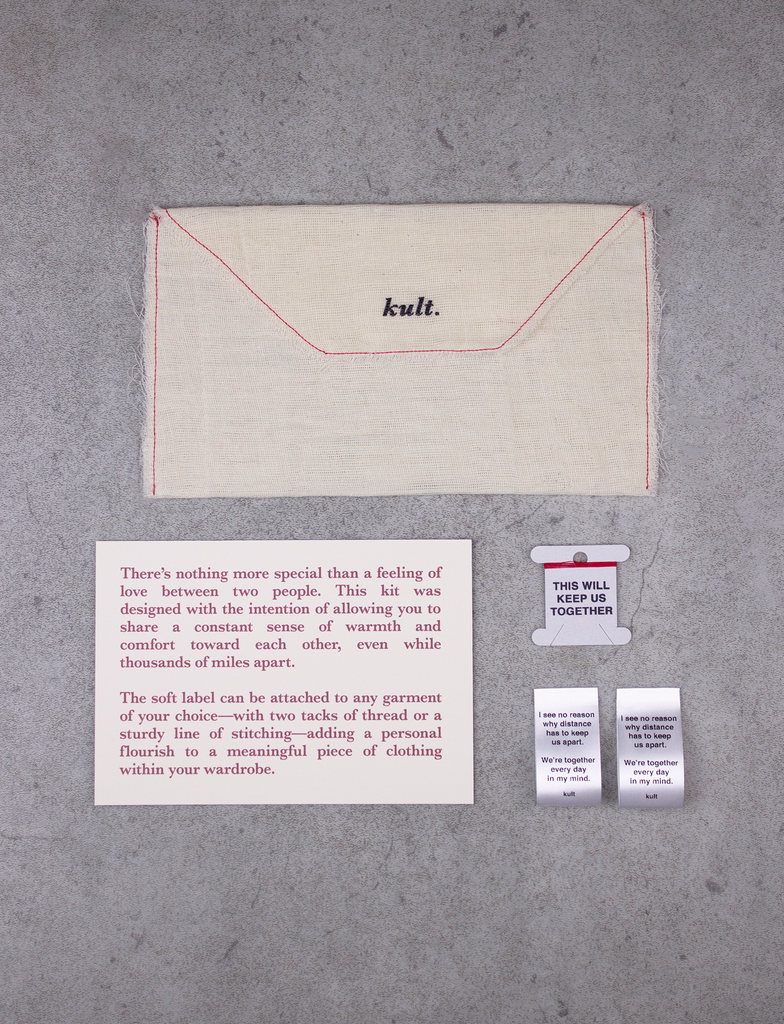 L.I.Y. (LOVE IT YOURSELF) KIT PACK ONE by KULT | Featuring 100% natural undyed muslin envelope, red polyester thread and personalised bobbin, 330gsm introduction card, and two HD satin labels with anti-fray technology in white.