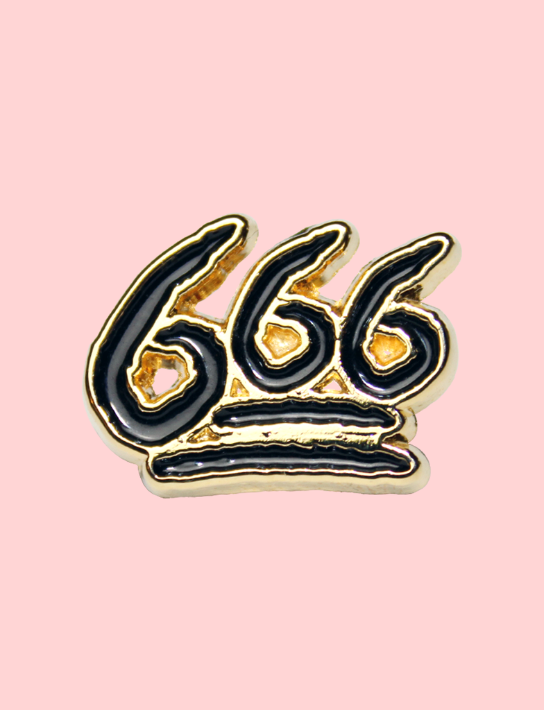 Front view of the 666 Enamel Pin by KULT in Black and Gold | Zinc alloy construction with black enamel paint detailing, finished the KULT wordmark and year of production on the reverse