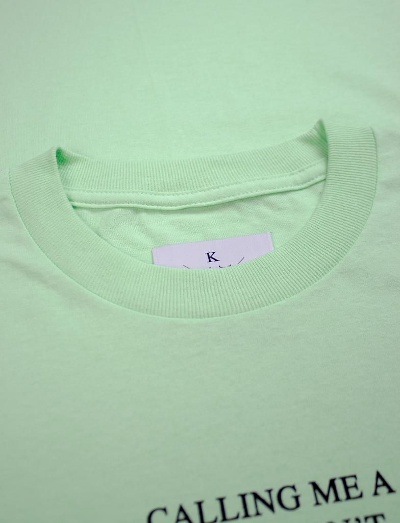 Neck label and detailing on the DON'T CALL ME Tee in Blossom by KULT Clothing | Calling me a slut won't make your parents love you