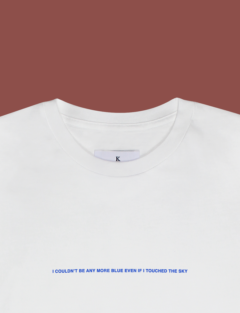 Close-up of the I'M BLUE Tee in White by KULT Clothing | I couldn't be more blue even if I touched the sky