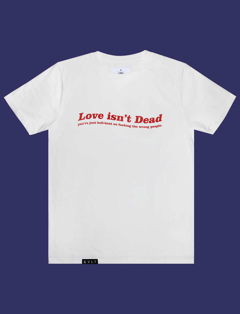 LOVE ISN'T DEAD Tee in White by KULT Clothing | eco-friendly, climate neutral t-shirt | Love isn't Dead you're just hell-bent on fucking the wrong people.