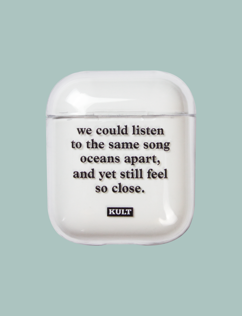 Front view of the OCEANS APART AirPods Case by KULT Clothing | We could listen to the same song oceans apart, and yet still feel so close. KULT