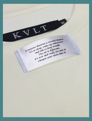 Close-up view of the appliqué label attached at the neckline on the SECOND CHANCE Tee by KULT Clothing | It reads 