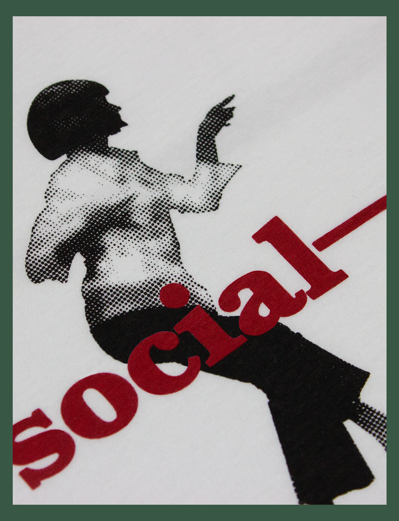 Close-up of the rear print on the SOCIAL DISTANCING Tee by KULT Clothing | social—distancing, Pulp Fiction, Uma Thurman, John Travolta